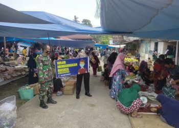 Polsek Bunut dan TNI Gelar Patroli Keamanan dan Penertiban Prokes di Pasar Minggu