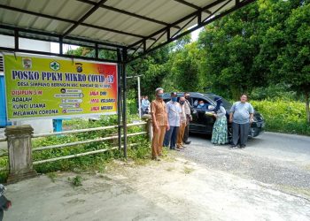 Personil Polsek Bandar Sei Kijang Cek Posko PPKM di Sejumlah Desa Wilayah Hukum