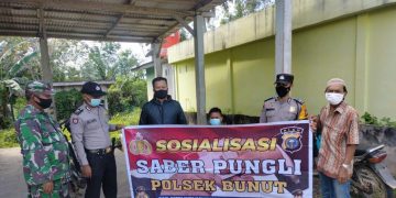 Polisi dan TNI Berantas Pungli di Wilkum Dengan Bersosialisasi Kepada Masyarakat Kecamatan Bunut
