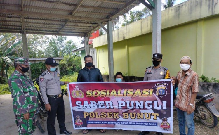 Polisi dan TNI Berantas Pungli di Wilkum Dengan Bersosialisasi Kepada Masyarakat Kecamatan Bunut
