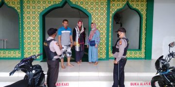 Polsek Ukui Laksanakan Sosialisasi Protokol Kesehatan Kepada Masyarakat