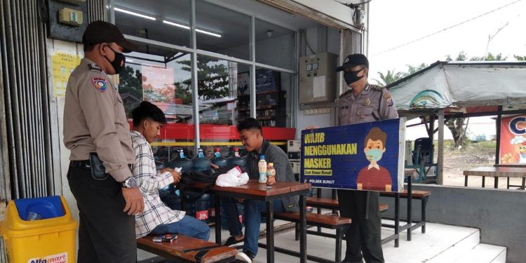 Polsek Lakukan Patroli C3 dan Sosialisasi Prokes di Kecamatan Bunut Pelalawan
