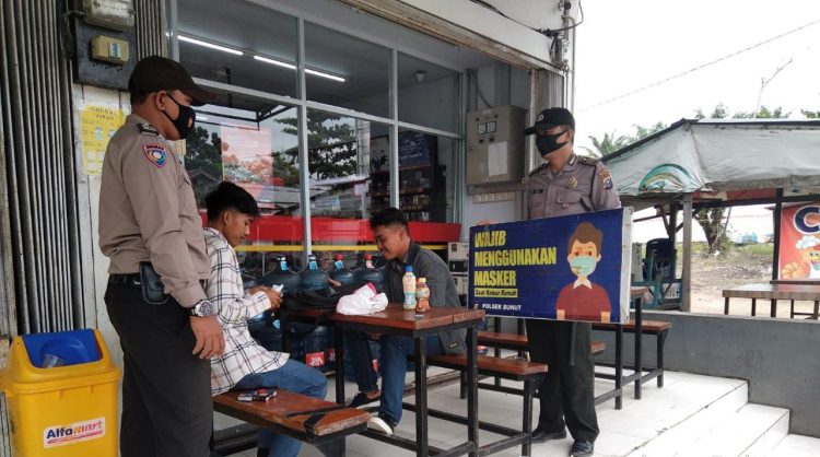 Polsek Lakukan Patroli C3 dan Sosialisasi Prokes di Kecamatan Bunut Pelalawan
