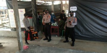 Personel Polsek Pangkalan Lesung Laksanakan Pengamanan Pilkades Serentak