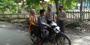 Polsek Teluk Meranti Pelalawan Sosialisasi Prokes dan Data Warga yang Tak Pakai Masker