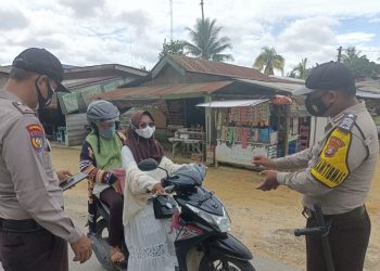 Polsek Kerumutan Ingatkan Warga Terapkan Prokes