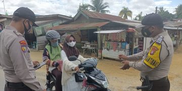 Polsek Kerumutan Ingatkan Warga Terapkan Prokes