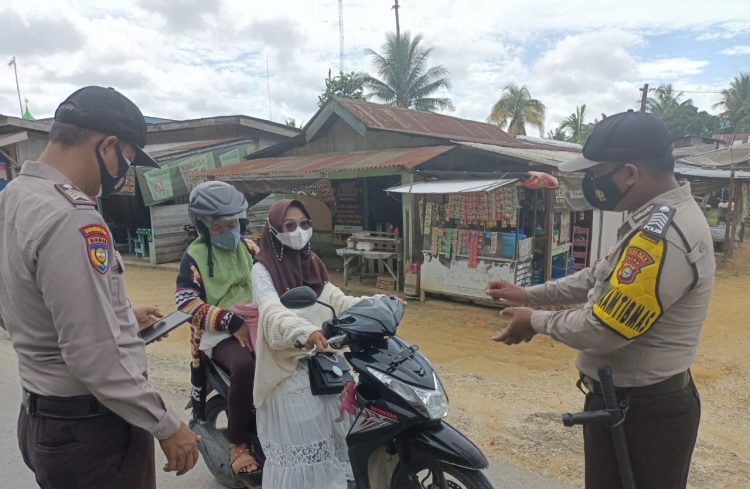 Polsek Kerumutan Ingatkan Warga Terapkan Prokes