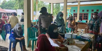 Dukung Pelaksanaan Vaksinasi Covid-19, Polsubsektor Pelalawan Lakukan Pengamanan