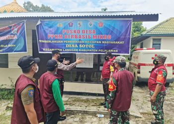 Kapolsek Langgam dan Tim Satgas Covid-19 Lakukan Pengecekan Posko PPKM