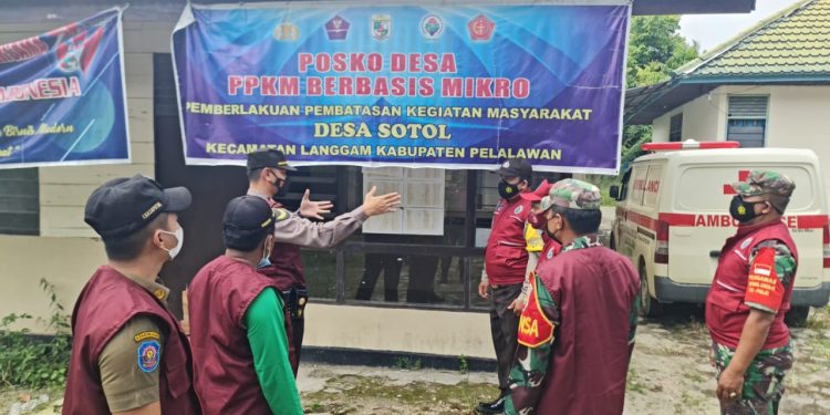 Kapolsek Langgam dan Tim Satgas Covid-19 Lakukan Pengecekan Posko PPKM