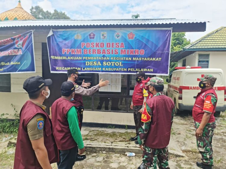 Kapolsek Langgam dan Tim Satgas Covid-19 Lakukan Pengecekan Posko PPKM