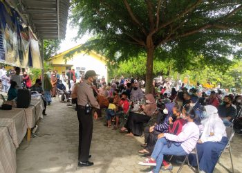 Kapolsek Bandar Sei Kijang Pimpin Pengaman Giat Vaksinasi Serentak di Wilkum