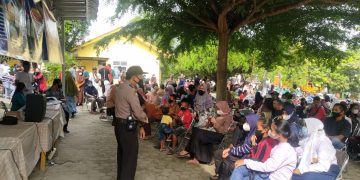 Kapolsek Bandar Sei Kijang Pimpin Pengaman Giat Vaksinasi Serentak di Wilkum