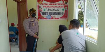 Kapolsek Kerumutan Awasi Pelaksanaan Vaksinasi Covid-19 di Puskesmas