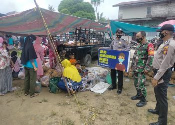 Sambangi Pusat Keramaian, Polsek Bunut dan TNI Patroli Kamtibmas dan Sosialisasi Prokes