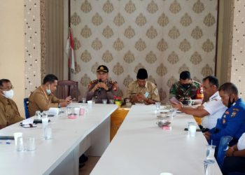 Kapolsek Kuala Kampar dan Upika Lakukan Rapat Sosialisasi Menghadapi Nataru dan Pencapaian Vaksinasi