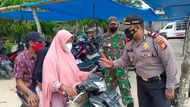 Kapolsek Kerumutan Kerahkan Personil Lakukan Operasi Yustisi
