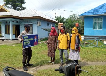 Polsek Teluk Meranti Imbau Masyarakat dan Pegawai Kantor Camat Selalu Terapkan Prokes