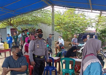 Polsek Kerumutan Sasar Pedagang Pasar Tradisional Untuk Lalukan Vaksinasi Covid-19