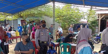 Polsek Kerumutan Sasar Pedagang Pasar Tradisional Untuk Lalukan Vaksinasi Covid-19
