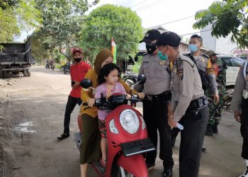 Kapolsek Teluk Meranti Lakukan Imbauan ‘Ayo Vaksin’ di Wilayah Binaannya