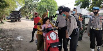 Kapolsek Teluk Meranti Lakukan Imbauan ‘Ayo Vaksin’ di Wilayah Binaannya