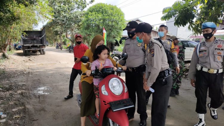 Kapolsek Teluk Meranti Lakukan Imbauan ‘Ayo Vaksin’ di Wilayah Binaannya