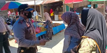 Cegah Gangguan Kamtibmas, Polsek Kerumutan Patroli di Pasar Tradisional