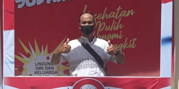 Tarik Minat Masyarakat, Polsek Pangkalan Kuras Hadirkan Photo Booth Vaksinasi