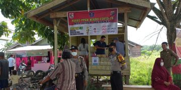 Kapolsek Teluk Meranti Tinjau dan Monitor Vaksinasi di Posko PPKM