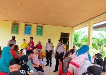 Polsek Bunut Imbau Masyarakat Terapkan Prokes Covid-19 di Ruas Jalan dan Ditempat Vaksin