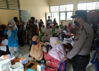 Polsek Ukui Bersama Puskesmas dan TNI Genjot Capaian Vaksinasi