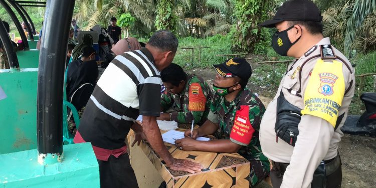 Polsek Langgam Gelar Vaksinasi di 4 Lokasi