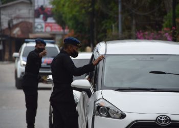 Brimob Polda Riau Gencar Ajak Masyarakat Untuk Vaksinasi, Sosialisasi di Medsos Hingga Turun ke Jalan