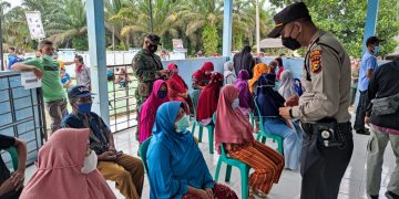 Polsubsektor Pelalawan Monitoring Giat Vaksinasi di Dusun Pangkalan Delik