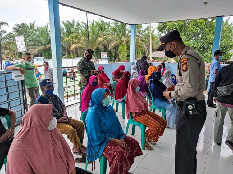Polsubsektor Pelalawan Monitoring Giat Vaksinasi di Dusun Pangkalan Delik