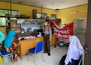 Polsek Teluk Meranti Kawal Pelaksanaan Vaksinasi Covid-19