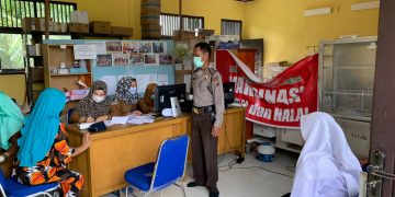 Polsek Teluk Meranti Kawal Pelaksanaan Vaksinasi Covid-19