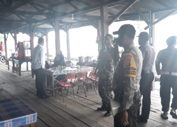 Sambangi Pelabuhan, Kapolsek Kuala Kampar Imbau Masyarakat Patuhi Prokes
