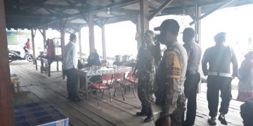 Sambangi Pelabuhan, Kapolsek Kuala Kampar Imbau Masyarakat Patuhi Prokes
