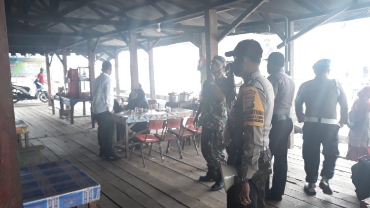Sambangi Pelabuhan, Kapolsek Kuala Kampar Imbau Masyarakat Patuhi Prokes