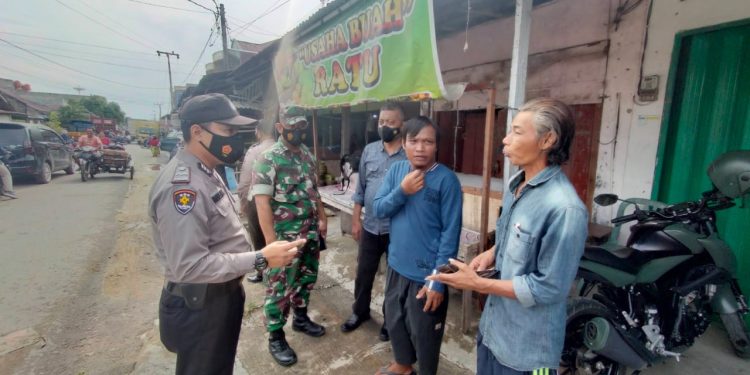 Polsek Pangkalan Kerinci Tegur 7 Pelanggar Prokes saat Yustisi