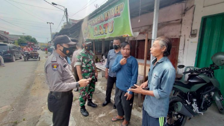 Polsek Pangkalan Kerinci Tegur 7 Pelanggar Prokes saat Yustisi