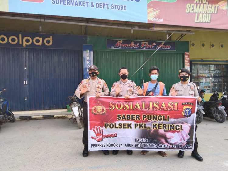 Polsek Pangkalan Kerinci Terus Sosialisasi Terhadap Petugas Parkir di Wilayah Hukum