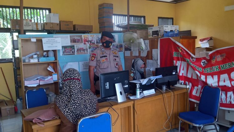 Polsek Teluk Meranti Imbau Masyarakat Tetap Terapkan Prokes di Gerai Vaksinasi