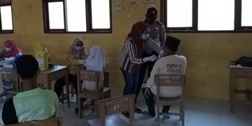 Personil Polsek Pangkalan Kuras Amankan Kegiatan Vaksinasi di 3 Lokasi