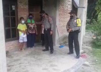 Kapolsek Bandar Sei Kijang Door to Door ke Rumah Warga, Ajak Vaksinasi ke Puskesmas
