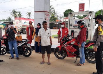 Polsek Ukui Jaga Kamtibmas dan Sosialisasi Prokes dengan Patroli