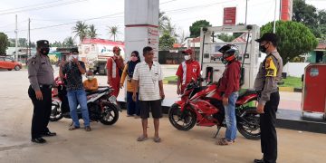 Polsek Ukui Jaga Kamtibmas dan Sosialisasi Prokes dengan Patroli